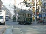 TPG - Nachschuss von den beiden Oldtimer Be 2/2 102 und Be 4/4 67 sowie dem ankommenden Be 6/8 874 bei der Haltestelle Lyon am 11.12.2009