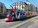 TPG - Tram Be 6/10 1808 mit Werbung unterwegs auf der Linie 14 in der Stadt Genf am 09.09.2013