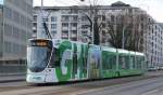 TPG STADLER TANGO 1807 mit GHI-Werbung unterwegs zwischen den Haltestellen Sismondi und France. 06.12.2013