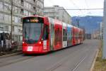 TPG STADLER TANGO 1818 mit Emirates-Werbung bei der Haltestelle Forumeyrin. 01.02.2014