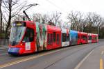 TPG STADLER TANGO 1818 mit Emirates-Werbung (und reparierter Schnauze) zwischen den Haltestellen Quidort und Jonction.