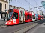 TPG - Tram Be 6/10 1818 unterwegs in der Stadt Genf am 08.03.2015