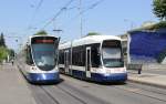 Genève / Genf TPG Tram 12 (Stadler-Tango Be 6/10 1815 / Bombardier-Flexity Be 6/8 879 ) Avenue des Communes-Réunies /  Palettes am 5.