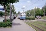 Zürich VBZ Tramlinie 7 (SWS/BBC/SAAS-Be 4/6 1663, Bj. 1967) Unterstrass, Milchbuck am 26. Juli 1993. - Scan eines Farbnegativs. Film: Kodak Gold 200-3. Kamera: Minolta XG-1. - Meine Überlegungen zur Bildgestaltung habe ich früher mitgeteilt; was das aktuelle Motiv betrifft, hätten es andere Fotografen vielleicht auf eine andere Weise behandelt! Beim Betrachten meiner älteren Fotos und auch dieser Serie mit Züricher Trams haben einige wahrscheinlich gedacht: Warum hat der Fotograf nicht gewartet oder warum hat er keinen zweiten oder dritten Versuch gemacht. Antwort 1: Beim digitalen Fotografieren machen einige / viele Fotografen eine kleine Serie und wählen danach das am besten geeignete Bild für die Veröffentlichung heraus. Das war schwieriger beim analogen Fotografieren, wenn man keine Kamera mit Motorantrieb besaß, und viel teurer war es unter allen Umständen auch. - Bei dem Aufenthalt im Juli 1993 in Zürich machte ich 61 Farbnegativaufnahmen; unter denen gab es zwei Fotos von Trolleybussen. Für das Hochladen auf BB habe ich 58 gewählt. Antwort 2: Die Zeit, die ich in Zürich zur Verfügung hatte, war begrenzt. Als Aufnahmedatum habe ich bei allen Bildern den 26. Juli 1993 geschrieben - so steht es nämlich in meinem Kalender und im Verzeichnis über meine Farbnegative - aber höchst wahrscheinlich habe ich Zürich erst am Vormittag des folgenden Tages verlassen; es gibt jedoch keine Dokumentation dafür, in meinem Kalender (und in den Verzeichnissen über meine Negative und Diapositive) steht nur, dass ich mich ab dem 27. Juli in Menton (Südfrankreich) befand! Welche und wie viele Fotos ich eventuell am 27. Juli 1993 habe machen können, weiß ich leider nicht mehr!