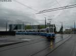 VBZ Nr. 2079+2031 (Be 4/6 ''Tram 2000'') am 7.8.2011 beim Bahnhof Stettbach am Wenden, whrend man im Hintergrund meinen knnte, das jngste GEricht sei nah!