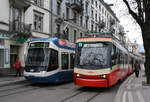 Be 5/6 3059 der VBZ und Be 4/6 57 der Forchbahn beim Bhf. Stadelhofen am 14.03.2010.