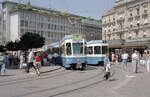 Zürich VBZ Tramlinie 8 (SWP/SIG/BBC-Be 4/6 2070, Bj. 1986 / Tramlinie 9 (SWS/SWP/BBC-Be 2/4 2411, Bj. 1986) Paradeplatz am 20. Juli 1990. - Scan eines Farbnegativs. Film: Kodak Gold 200-2 5096. Kamera: Minolta XG-1.