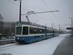 Nr. 2028+2034 (VBZ Be 4/6 ''Tram 2000'') am 28.1.2010 bei heftigem Schneetreiben bei der 11er Endstation Auzelg.