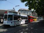 VBZ Nr. 2051+2315 ''Lckenlos verbunden'' (Be 4/6 Tram 2000 + Be 4/6 ''Blinde Kuh'') am 7.7.2011 beim Bellevue. An der neusten ZVV Kampagne beteiligten sich auch die VBZ, indem sie die acht Fahrzeugseiten einer T2000-Dotra mit den acht marktverantwortlichen Verkehrsunternehmen des Kantons Zrich beklebt haben. Auf der linken Fahrzeugseite ist zu sehen: ZSG, SZU, PostAuto und VBG.