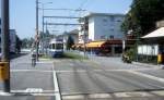 Zrich VBZ Tram 9 (Be 2/4 24xx) Schwamendingen, Saatlenstrasse / Blaucker im August 1986.