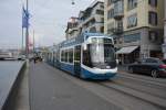 Am 14.10.2015 fährt diese Tram Cobra  3013  auf der Linie 4 durch Zürich. Aufgenommen an der Haltestelle Zürich Rathaus.