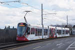 Be 6/10 Tango 187 mit der Werbung für den Wohnpark Binzen, auf der Linie 11, fährt zur Haltestelle Münchensteinerstrasse.