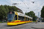Be 6/10 Tango 159, auf der Linie 11, fährt am 10.07.2023 zur Haltestelle am Bahnhof SBB.