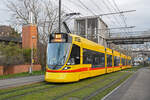 Be 6/10 Tango 185, auf der Linie 10, verlässt am 18.12.2024 die Haltestelle ZOO Basel.