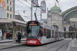 Be 6/10 Tango 187 mit der Werbung für den Wohnpark Binzen, auf der Linie 11, bedient am18.02.2025 die Haltestelle am Bahnhof SBB.