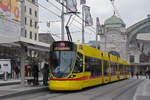 Be 6/10 Tango 185, auf der Linie 11, bedient am 18.02.2025 die Haltestelle am Bahnhof SBB.