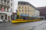 Be 6/10 Tango 163, auf der Linie 11, fährt am 10.02.2025 zur Haltestelle Bahnhof SBB.