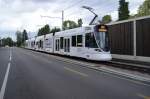 Am 16.08.2014 war der Basler Be 6/10 166 kurz vor der Haltestelle Stollenrain unterwegs nach Dornach.