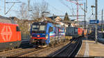 SBB Cargo International 193 532  Nightpiercer  durchfährt am 28. Februar 2021 mit einem UKV-Zug den Bahnhof Liestal.