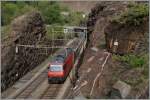 Die SBB Re 460 068-2 hat mit ihrem IR 2163 Basel SBB - Locarno den 1568 langen Freggio Kehrtunnel verlassen und passiert nun die Freggio Brücke über den Ticino um nach dem Einschnitt die