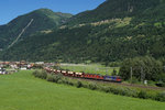 Re 420 346-9 und Re 6/6 11606 befinden sich am 19.07.2016 mit einem Kieszug bei Ambri-Piotta.