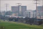 Zugbegegnung bei Rheinfelden mit einer Doppelgarnitur RABe 522 und Re 460 105-0. Mrz 2016.