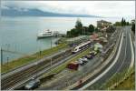 Trotz einer erfreulich hohen Frequenz auf der Strecke Lausanne - Villeneuve ist es nur selten mglich zur richtigen Zeit am richtigen Ort zu sein und ein  Zug mit Schiff Bild  zu bekommen.