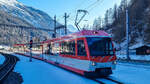 Matterhorn Gotthard Bahn  Zermatt Shuttle Albatros  bei der Ankunft aus Zermatt in Täsch, 10.02.2023.