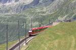 Diese modernen Triebz�ge sind auf der Strecke Alltag geworden. Hier am 05.07.2026  zwischen N�tschen und Andermatt gleich neben der auch bei Motorradfahrern beliebten Passstrasse.