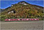 S1 1514 mit ABe 4/16 3102 vor dem Fadärastein bei Malans. (25.10.2018)