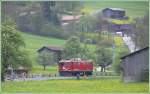 Ge 4/4 I 605  Silvretta  hat zwei leere Holzwagen nach Furna gebracht und ist jetzt bei Schiers auf der Rckfahrt nach Landquart.