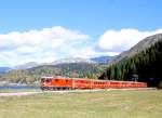RhB Schnellzug 41 Landquart - Davos Platz mit Ge 4/4II 614 - D 4225 - A - B - B - B - AB - B am 26.10.1997 kurz vor Davos Dorf