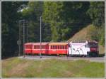 RE 1044 aus Davos Platz mit schiebender Ge 4/4 III 659  Seewis-Valzeina  unterhalb von Saas im Prttigau. (24.09.2009)