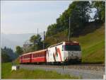 RE 1049 mit Ge 4/4 III 649  Lavin  bei Saas. (24.09.2009)