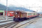 RhB Salonzug fr RHTIA TOURS 3032 von Davos Platz nach Landquart am 01.09.1996 Bereitstellung in Davos Platz mit E-Lok Ge 4/6 353 - AS 1144 - AS 1141 - AS 1143 - D 4052I. Hinweis: sehr trbes Regenwetter, Salonwagen inzwischen alle umgebaut.
