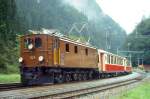 RhB Salonzug fr RHTIA TOURS 3032 von Davos Platz nach Landquart am 01.09.1996 in Fideris Dorf mit E-Lok Ge 4/6 353 - AS 1144 - AS 1141 - AS 1143 - D 4052I. Hinweis: sehr trbes Regenwetter, Salonwagen inzwischen alle umgebaut.
