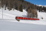 Sportzug nach Davos Platz mit dem Be 4/4 514 an der Spitze am 21.01.2017 unterhalb von Davos Wolfgang.