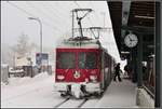 Der RE1046 aus Davos mit Vorortpendel Be 4/4 511  ist in Klosters-Platz eingetroffen.