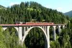 RhB - Regionalzug 1820 von Filisur nach Davos Platz am 20.07.2009 auf Wiesener Viadukt mit Steuerwagen BDt 1755 - B 2347 - B 2342 - A 1248 - E-Lok Ge 4/4III 648  