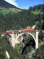 RhB EW-VI-Extrazug fr RHTIA INCOMONG 3142 von Filisur nach Davos-Platz vom 11.09.1994 auf Wiesener Viadukt stehend mit E-Lok Ge 4/4III 644 - B 2391 - WRS 3821 - B 2393.