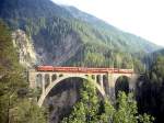 RhB NEUPENDELZUG 165 von Davos Platz nach Filisur am 31.08.1996 auf Wiesener Viadukt mit Steuerwagen BDt 1731 - B 2329 - B 2333 - AB 1517 - Ge 4/4I 607.