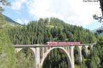 Be 4/4 516 am 10.8.2013 auf dem Wiesener-Viadukt als Regio nach Filisur.