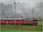 Morgennebel in Castrisch. Ge 6/6 II 701  Rtia  mit RE nach Disentis. (04.10.2007)