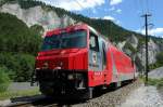 Ge 4/4 III 651  Fideris  Baujahr 1999. Der GlacierExpress mit Eigenwerbung auf der Lok in der Rheinschlucht beim Bhf. Versam-Safien. 30.6.2008
