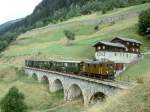 RhB Extrazug fr GRAUBNDEN TOURS 3238 von Disentis nach Landquart vom 30.08.1997 bei Compadials mit E-Lok-Oldtimer Ge 2/4 222 - B 2247 - B 2246 - D 4052I.
