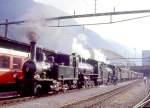 RhB Kursbuch-Dampfzug 6766 von Disentis nach Landquart vom 27.08.1995 in Chur mit Dampflok-Dreifachbespannung G 3/4 1 - G 4/5 108 - G 4/5 107 - B 2247 - D 4052I - B 2246 - A 1102 - B 2060 - B 2245