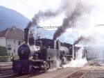 RhB Kursbuch-Dampfzug 6766 von Disentis nach Landquart vom 27.08.1995 in Domat-Ems mit Dampflok-Dreifachbespannung G 3/4 1 - G 4/5 108 - G 4/5 107 - B 2247 - D 4052I - B 2246 - A 1102 - B 2060 - B