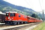 RhB REGIONALZUG 741 von Chur nach Disentis am 25.06.1994 in Trun mit E-Lok Ge 4/4II 615 - B 2212 - B 2213 - B 2366 - A 1242 - B 2373 - B 2367 - D 4208.