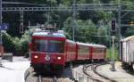 Am 20.5.2009 fhrt Lok 514 der Rthischen Bahn mit einem Zug nach Chur  in Reichenau ein.