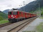 RhB Ge 4/4 II 616 vor dem Reg 244 Disentis/Mustr - Chur am 11.05.2003 in Sumvitg - Cumpadials